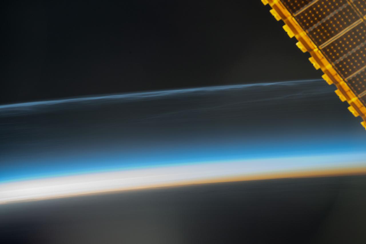 Noctilucent Clouds Above Earths Horizon