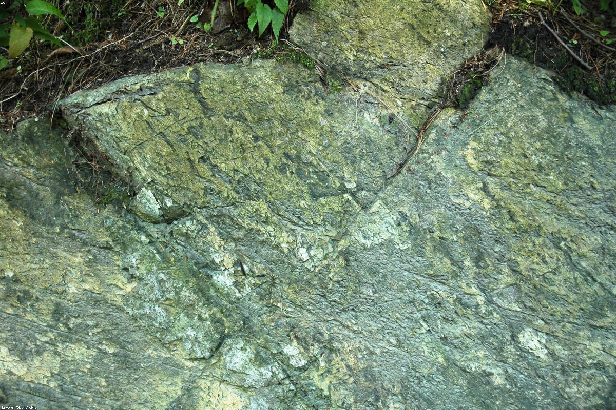 Serpentine rock with iron streaks