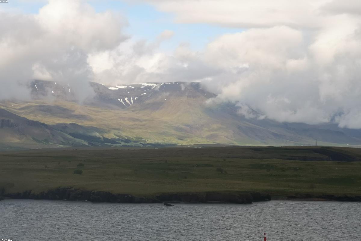 Rocky coast under heavy cloud