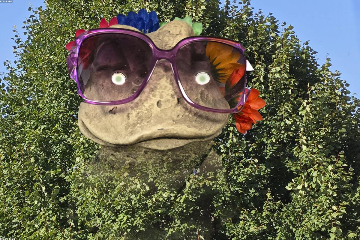 Leaf-shaped frog on forest floor