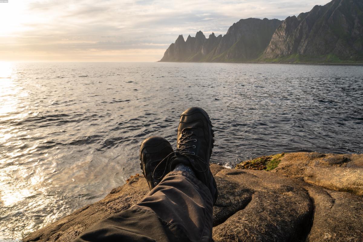Wide view of fjord with midnight sun
